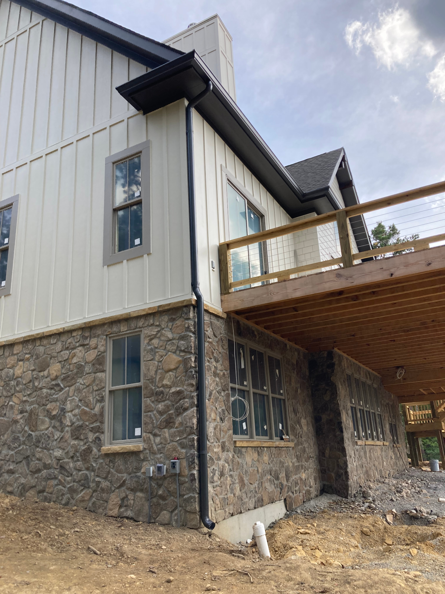 Modern Home with Black Gutters